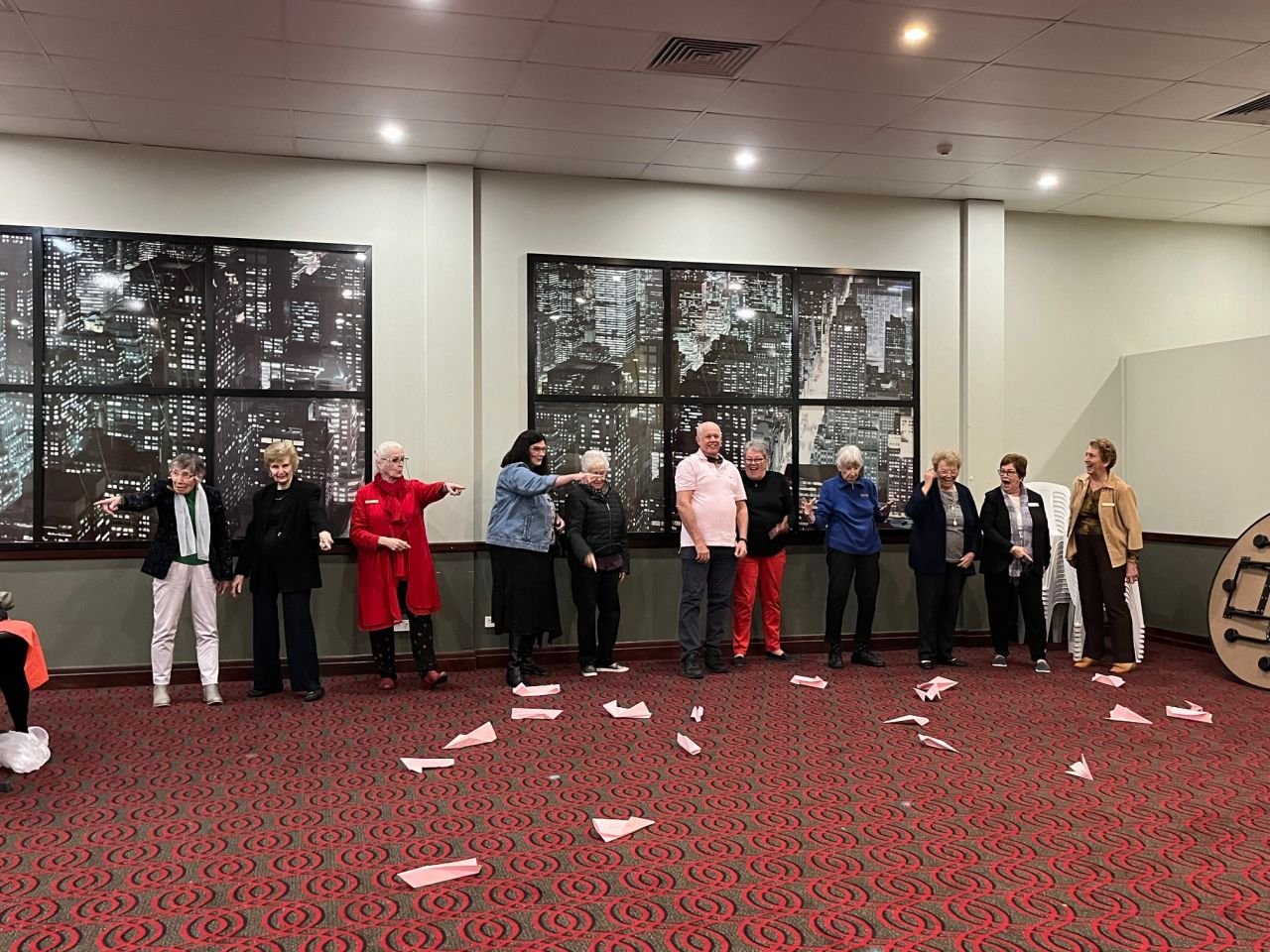 Paper plane competition during June 2024 meeting