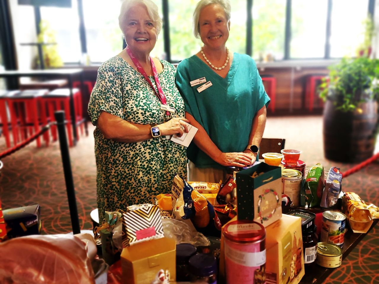 Christmas Lunch at The Brunswick, December, 2024. 
Diane & Anne acknowledging all the Christmas treats brought in by our members for the Brunswick Pantry. Thank you everyone!