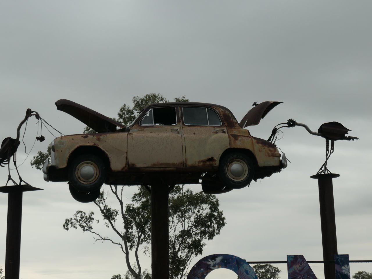 Lightening Ridge Trip - Leaving Goondiwindi for home- - There was this "Once apon a time" artwork just out of town. (Vultures or pterodactyls make short work of a car)