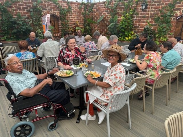 Part of the members at lunch at the Last Local