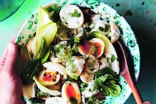 Creamy potato and greens salad with zesty anchovy dressing